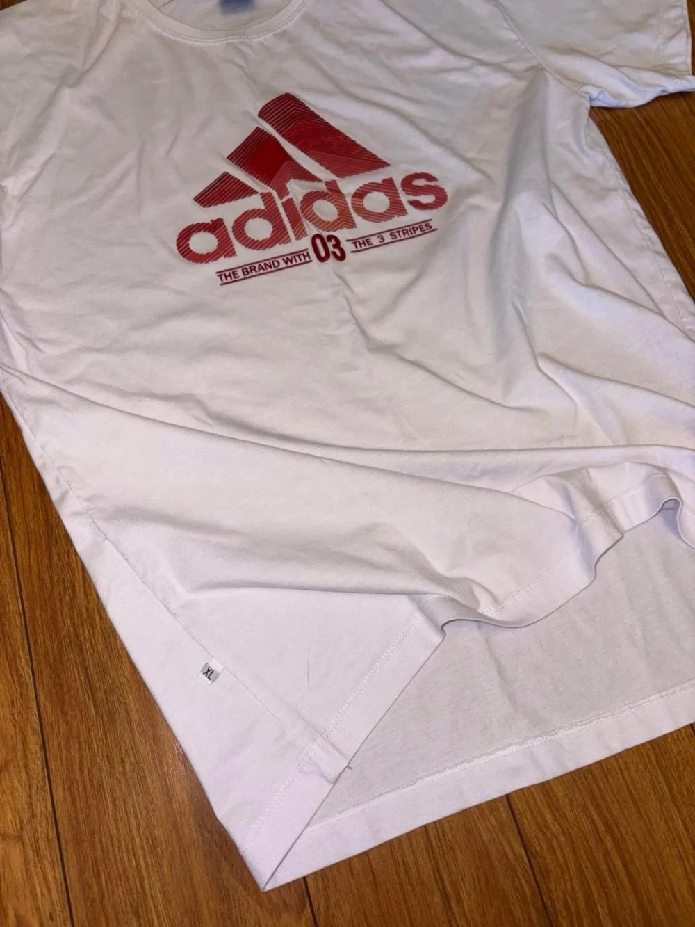 Vintage Adidas tee with red logo